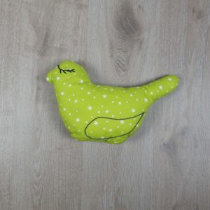 Coussin forme oiseau vert étoiles