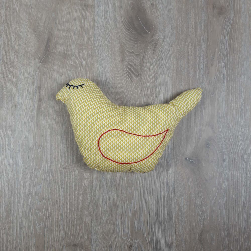 Coussin forme oiseau jaune